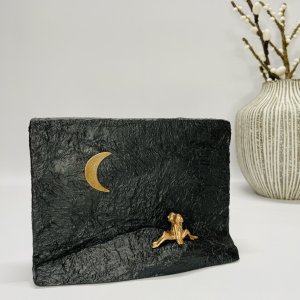 F�lles dr�mme - bronzeskulptur p� sten